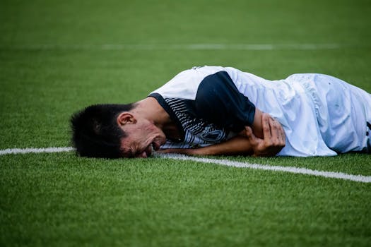 player on the sidelines with an injury